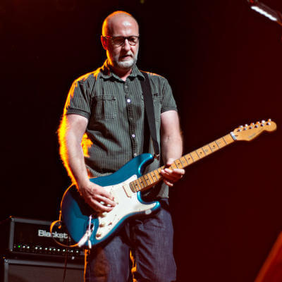 Bob Mould playing his guitar